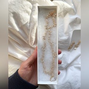 Beautiful brand new rose gold bridal necklace and earrings set.